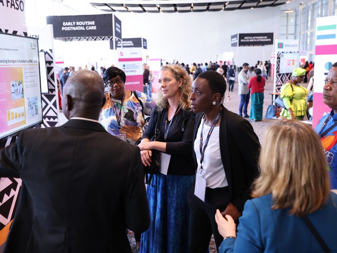 Conference attendees discuss child health financing strategies in Burkina Faso at the country showcase at the International Maternal and Newborn Health Conference 2023